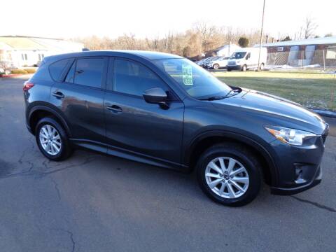 2015 Mazda CX-5 for sale at BETTER BUYS AUTO INC in East Windsor CT