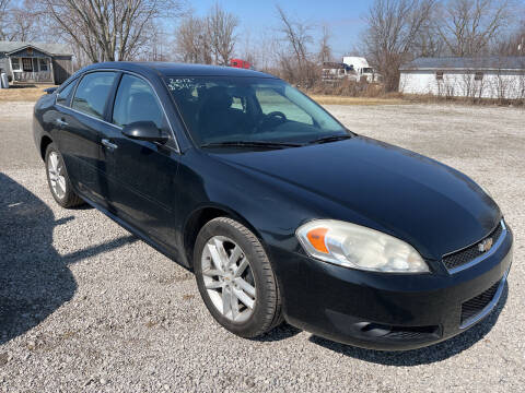 2012 Chevrolet Impala for sale at HEDGES USED CARS in Carleton MI