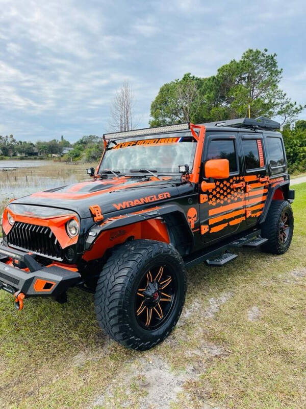 2015 Jeep Wrangler Unlimited for sale at Santana Auto in Altamonte Springs FL