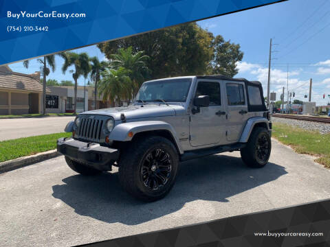 2013 Jeep Wrangler Unlimited for sale at BuyYourCarEasyllc.com in Hollywood FL