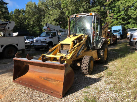 2003 New Holland 555E Backhoe for sale at M & W MOTOR COMPANY in Hope AR