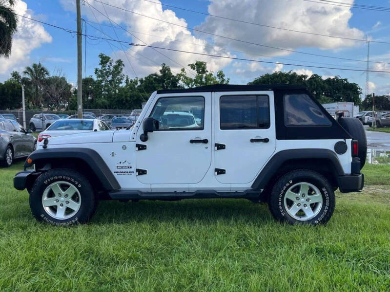 2014 Jeep Wrangler Unlimited for sale at INTERNATIONAL AUTO BROKERS INC in Hollywood FL