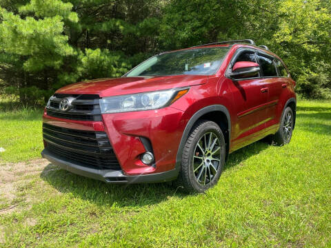 2017 Toyota Highlander for sale at Rombaugh's Auto Sales in Battle Creek MI