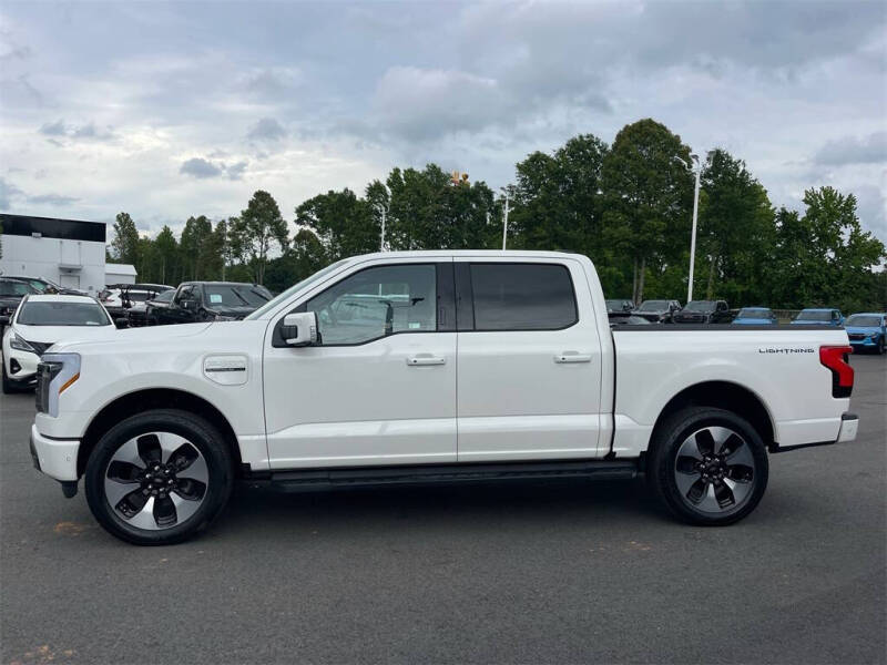Used 2023 Ford F-150 Lightning Platinum with VIN 1FT6W1EV6PWG25268 for sale in Reidsville, NC