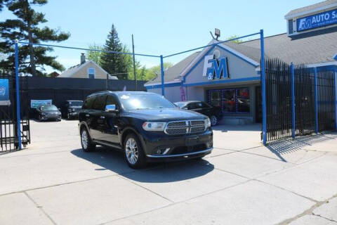 2014 Dodge Durango for sale at F & M AUTO SALES in Detroit MI