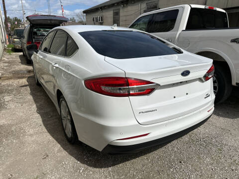 2019 Ford Fusion Hybrid for sale at CHEAPIE AUTO SALES INC in Metairie LA