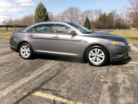 2011 Ford Taurus for sale at Crossroads Used Cars Inc. in Tremont IL