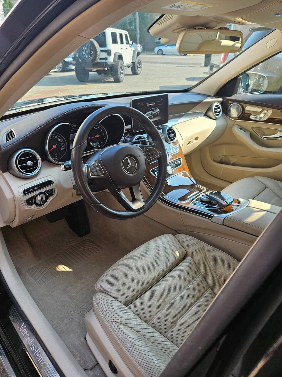 2015 Mercedes-Benz C-Class for sale at RENOS AUTO SALES LLC in Waterbury, CT