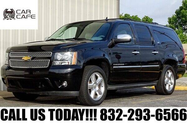 2013 Chevrolet Suburban for sale at CAR CAFE LLC in Houston TX