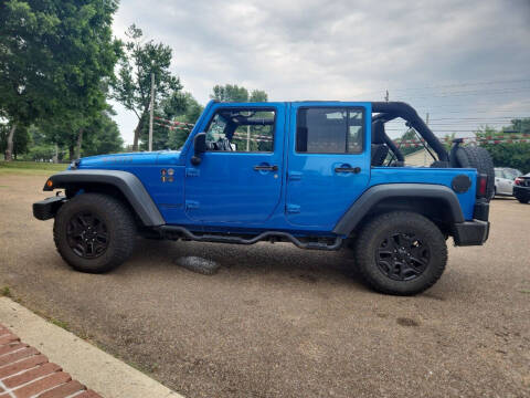 2015 Jeep Wrangler Unlimited for sale at Frontline Auto Sales in Martin TN