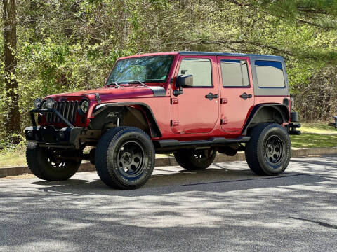 2012 Jeep Wrangler Unlimited for sale at H and S Auto Group in Canton GA