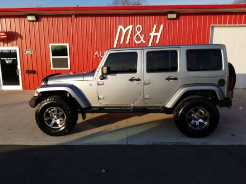 2013 Jeep Wrangler Unlimited for sale at M & H Auto & Truck Sales Inc. in Marion IN