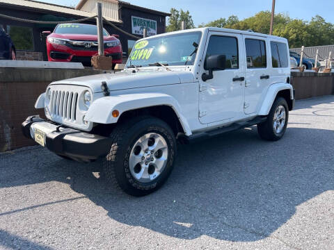 2015 Jeep Wrangler Unlimited for sale at WORKMAN AUTO INC in Bellefonte PA