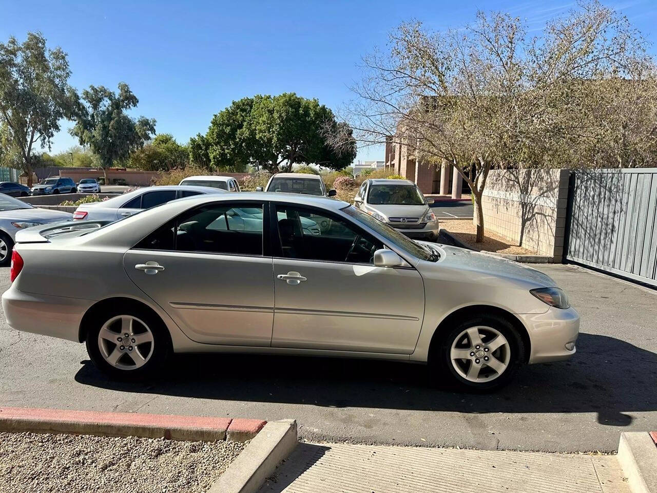 2003 Toyota Camry for sale at HUDSONS AUTOS in Gilbert, AZ