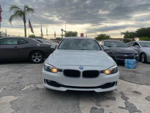 2015 BMW 3 Series for sale at America Auto Wholesale Inc in Miami FL