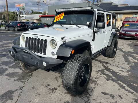 2015 Jeep Wrangler Unlimited for sale at Rey's Auto Sales in Stockton CA