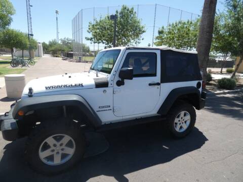 2013 Jeep Wrangler for sale at J & E Auto Sales in Phoenix AZ