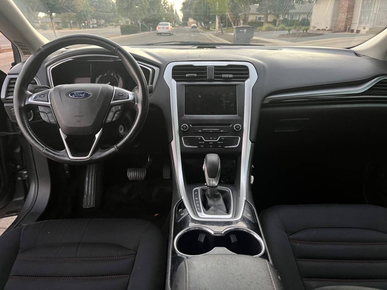 2016 Ford Fusion Hybrid for sale at AUTO 4 LESS in Fresno, CA