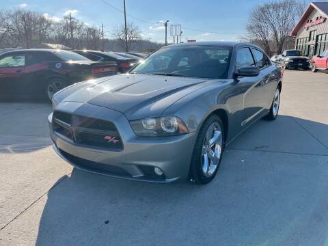 2012 Dodge Charger for sale at Azteca Auto Sales LLC in Des Moines IA