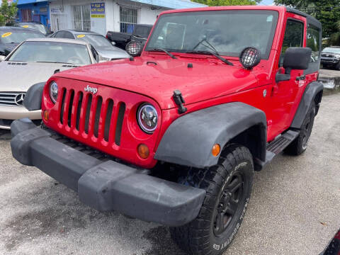 2009 Jeep Wrangler for sale at Plus Auto Sales in West Park FL