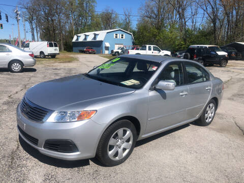 2010 Kia Optima for sale at BELL AUTO & TRUCK SALES in Fort Wayne IN