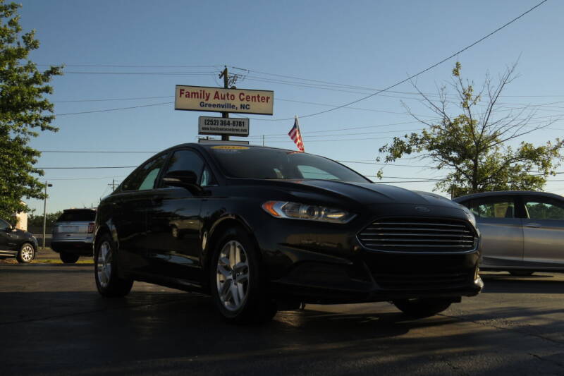 2015 Ford Fusion for sale at FAMILY AUTO CENTER in Greenville NC