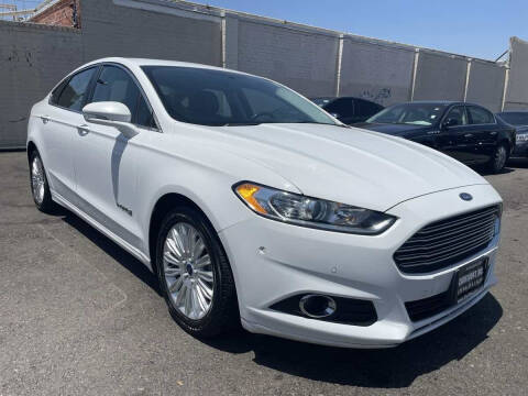 2016 Ford Fusion Hybrid for sale at CARFLUENT, INC. in Sunland CA