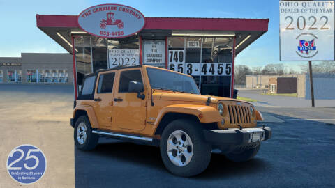 2013 Jeep Wrangler Unlimited for sale at The Carriage Company in Lancaster OH