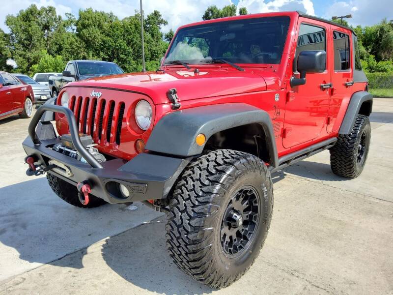 2012 Jeep Wrangler Unlimited for sale at Texas Capital Motor Group in Humble TX