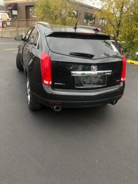 2012 Cadillac SRX for sale at Mike's Auto Sales in Rochester NY