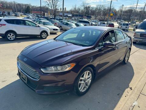 2013 Ford Fusion for sale at Auto Outlet in Des Moines IA