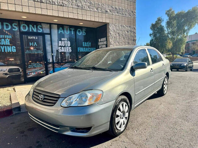 2003 Toyota Corolla for sale at HUDSONS AUTOS in Gilbert, AZ