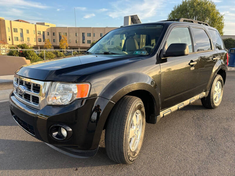 2011 Ford Escape for sale at CALIFORNIA AUTO GROUP in San Diego CA