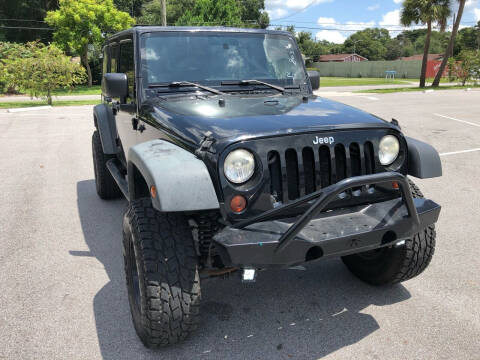 2009 Jeep Wrangler Unlimited for sale at Consumer Auto Credit in Tampa FL