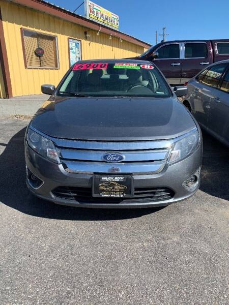 2011 Ford Fusion for sale at BELOW BOOK AUTO SALES in Idaho Falls ID