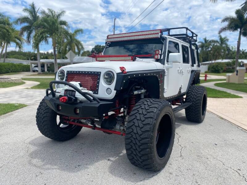 2013 Jeep Wrangler Unlimited for sale at BIG BOY DIESELS in Fort Lauderdale FL