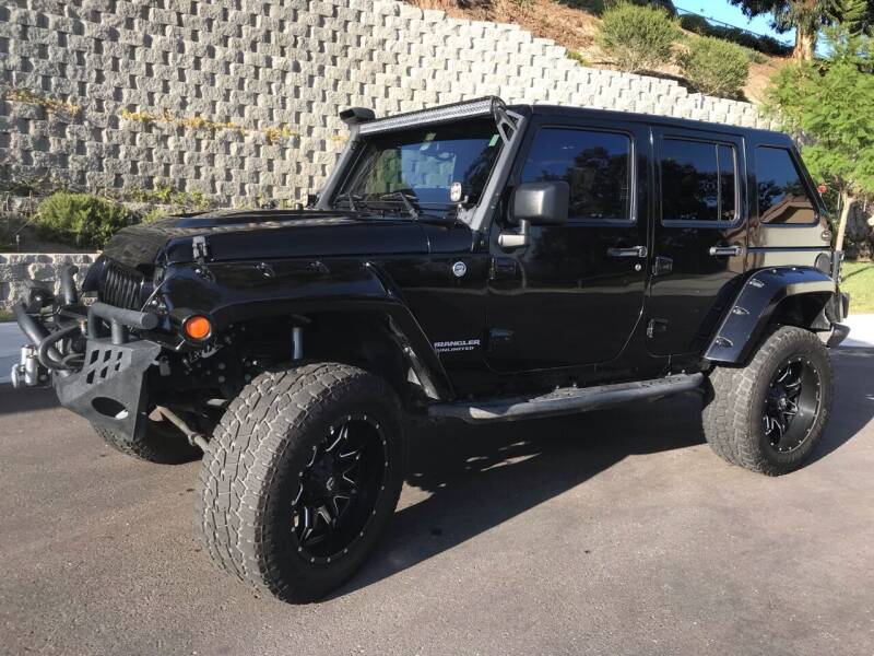 2015 Jeep Wrangler Unlimited for sale at CALIFORNIA AUTO GROUP in San Diego CA