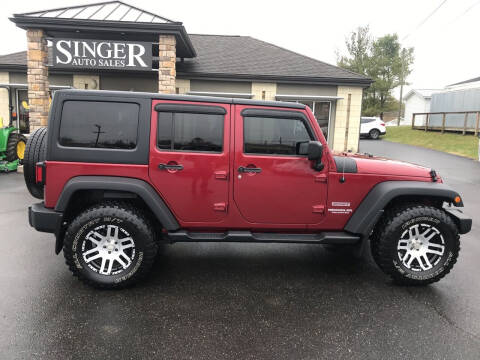 2012 Jeep Wrangler Unlimited for sale at Singer Auto Sales in Caldwell OH