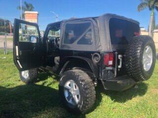 2011 Jeep Wrangler for sale at DAN'S DEALS ON WHEELS AUTO SALES, INC. in Davie FL