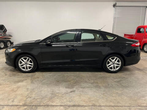 2014 Ford Fusion for sale at Daniel Used Auto Sales in Dallas GA