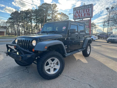 2012 Jeep Wrangler Unlimited for sale at Carafello's Auto Sales in Norfolk VA