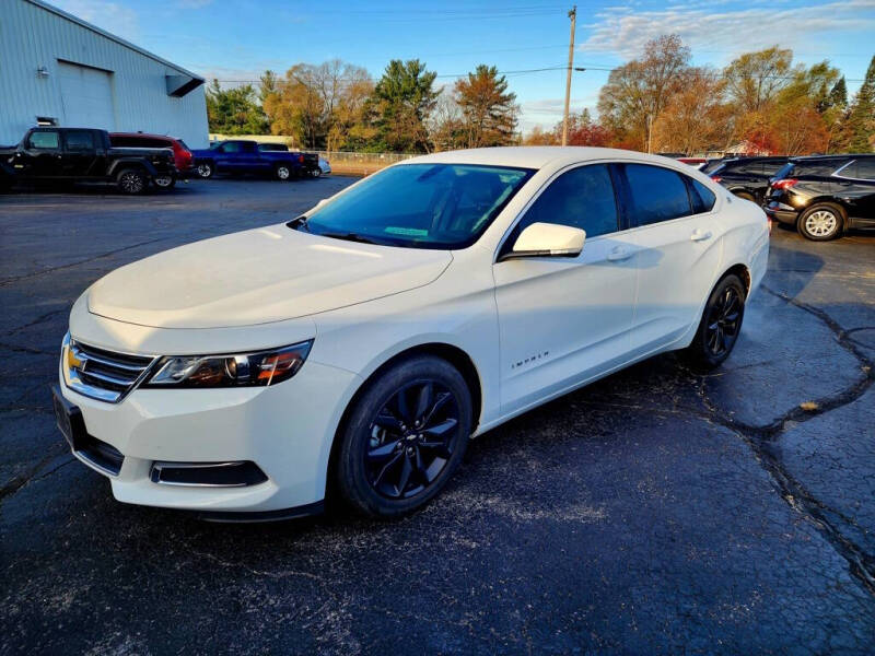 Used 2017 Chevrolet Impala 1LT with VIN 2G1105S39H9166133 for sale in Adams, WI