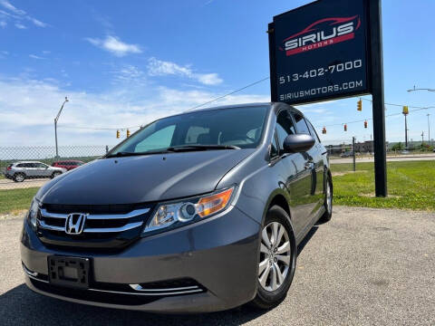 2014 Honda Odyssey for sale at SIRIUS MOTORS INC in Monroe OH