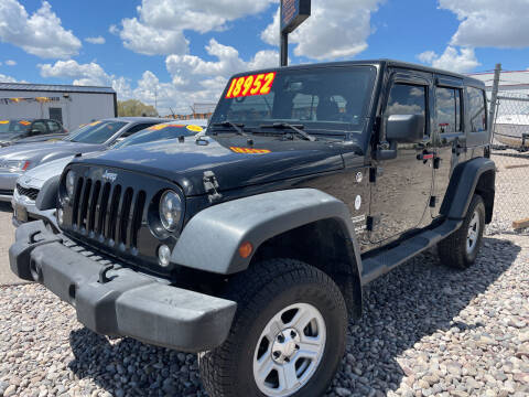 2014 Jeep Wrangler Unlimited for sale at BELOW BOOK AUTO SALES in Idaho Falls ID