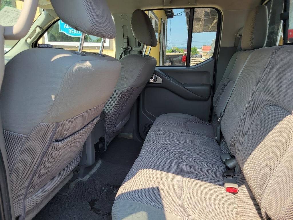 2016 Nissan Frontier for sale at DAGO'S AUTO SALES LLC in Dalton, GA