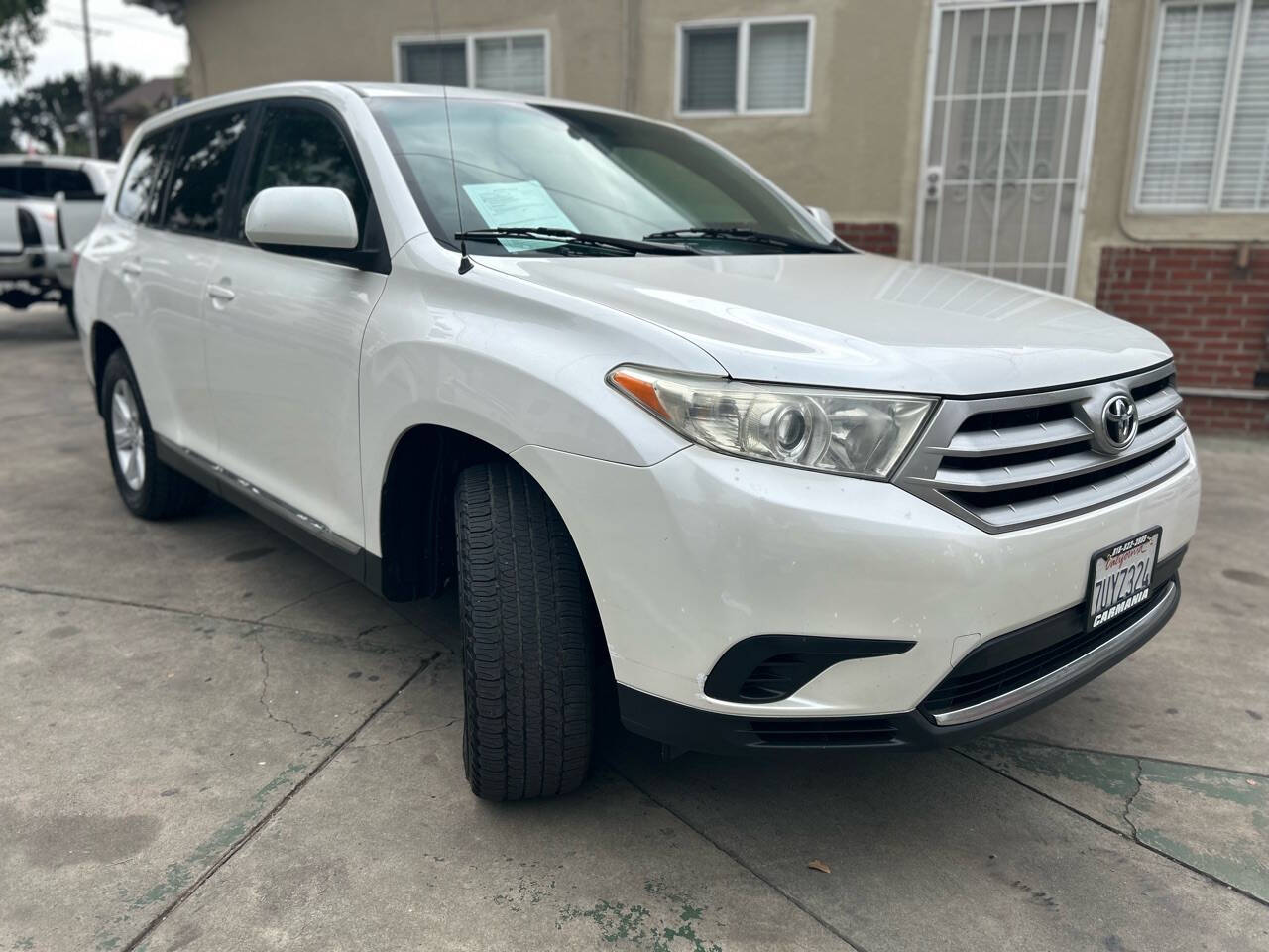 2012 Toyota Highlander for sale at Carmania in Panorama City, CA