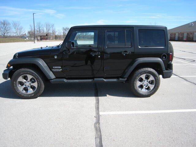 2016 Jeep Wrangler Unlimited for sale at FINNEY'S AUTO & TRUCK in Atlanta IN