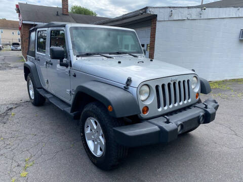 2010 Jeep Wrangler Unlimited for sale at James Motor Cars in Hartford CT