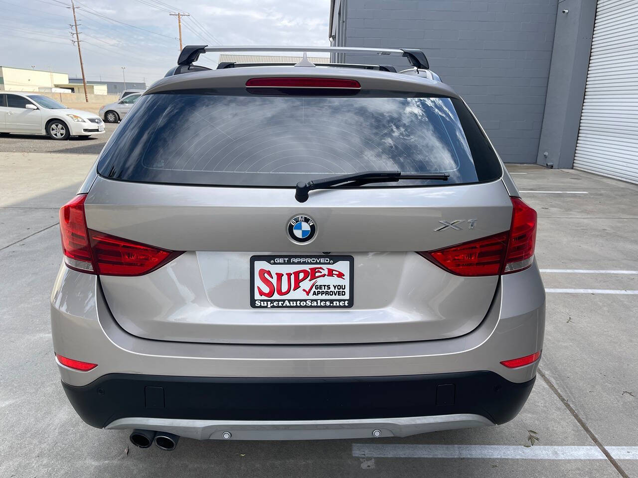 2014 BMW X1 for sale at Super Auto Sales Modesto in Modesto, CA