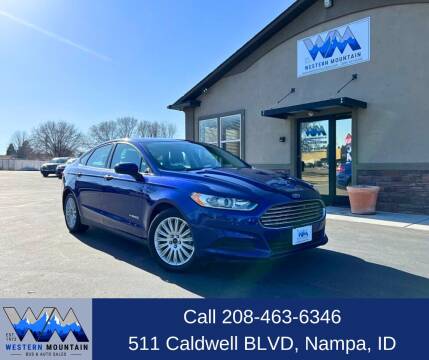 2015 Ford Fusion Hybrid for sale at Western Mountain Bus & Auto Sales in Nampa ID